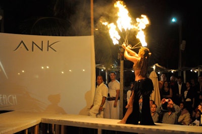 Fire dancers performed at Nikki Beach on the runway where swimwear labels ANK by Mirla Sabino and Salinas held fashion shows for nearly 1,200 people.