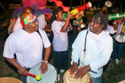 Percussionists played and danced in the street as part of artist Edouard Duval Carrié's 'Under the Moon ' sculpture exhibit and Ra Ra Parade down Ocean Drive.