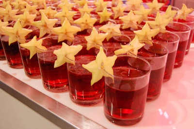 Bartenders served a cranberry-starfruit cocktail to guests.