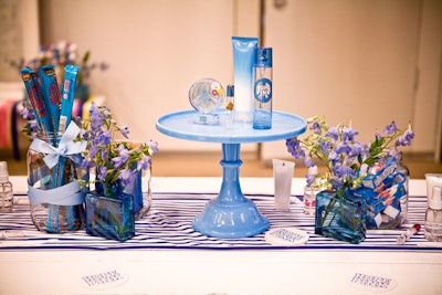 The scenery in the more formal presentation room matched the rest of the event, with picnic tables decorated to match the color of each scent's bottle. Jars of sweets from Dylan's Candy Bar added to the color-coordinated look and provided editors with plenty to nibble on.