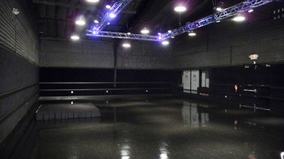 SIR's all-black studio has a built-in truss system and can hold 100 for events.
