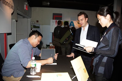 Booths adjacent to the stage allowed speakers like Chang to interact on a more personal level with conference attendees.