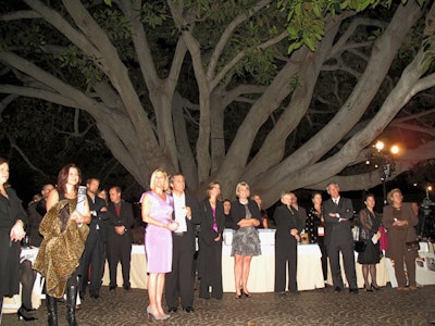 Guests gathered beneath the fig tree at the Fairmont Miramar Hotel for the Chrysalis fund-raiser.