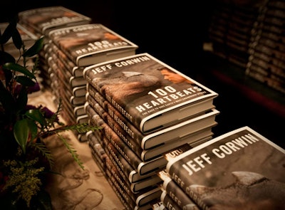 At the entrance to the Occidental's upstairs Monument Room, a table held stacks of autographed copies of Jeff Corwin's new book, 100 Heartbeats, which focuses on endangered species and conservationists ' efforts to save these animals.
