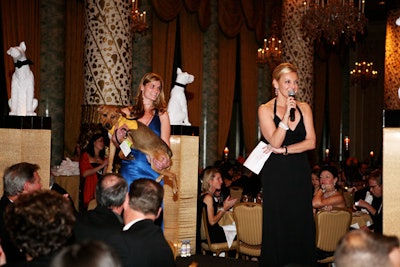 The live auction was divided into two parts: One segment allowed guests to bid on items such as getaway packages; another portion let them donate directly to Pets Are Worth Saving.