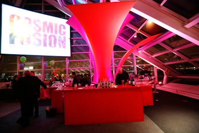 Ronsley Special Events brought in four red bars and fuchsia and orange structures that event designer Burt Rubenstein called 'soaring fabric wings. '