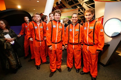 Volunteers dressed as astronauts greeted guests and helped point out bidders during the live auction.