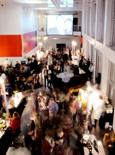 Stations devoted to food and wine lined the atrium of the Museum of Contemporary Art; a drop-down projection screen showcased photos from the Patron lounge.