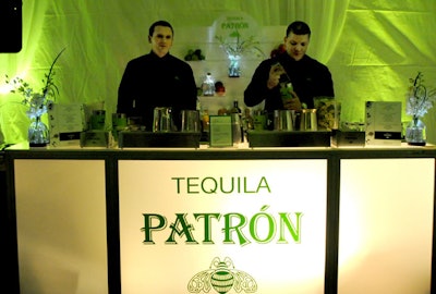 Bartenders made tequila-based cocktails at a branded bar in the Patron lounge.