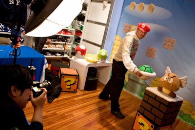 Inside the store, customers posed in a Mushroom Kingdom set for souvenir photographs.