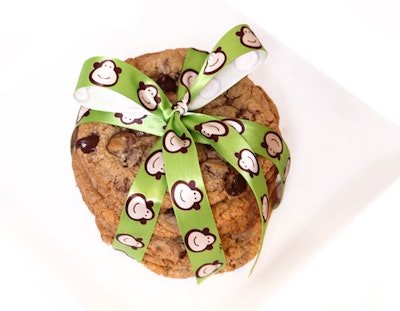 Cookie Monkey can package treats in a traditional white bakery box or in clear plastic bags tied with a the company's signature monkey-print ribbon, or ribbon with a corporate logo.