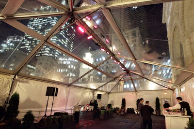 Peterson Party Rentals supplied the frame-style tent with a clear top, which was adjacent to the Woodward. Housing overflow party guests, the 30- by 60-foot structure had doors and black carpeting.