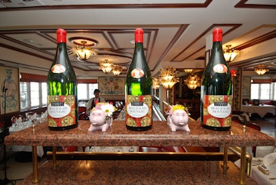 Large bottles of the Beaujolais Nouveau 2009 lined the top of the cashier stations throughout the restaurant.
