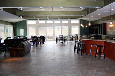 Decks on two sides of the tasting room offers views of the vineyards and pond.