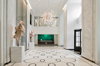 Local firm Simeone Deary Design Group decorated the property, drawing inspiration from 1920s Paris and the work of Coco Chanel and Christian Dior.