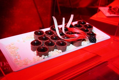 The Hilton Chicago prepared chocolate tarts garnished with golden candy swirls.