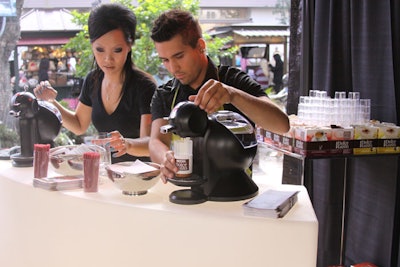 Baristas at the Dolce Gusto promo made drinks for passersby.