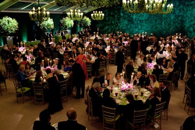 Three of the tent's walls were covered floor to ceiling in deep green velvet that after dinner revealed the 60-foot stage and views of the Washington Monument and the Jefferson Memorial.