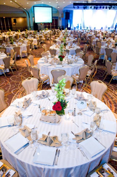 Event producer Roxanne Rukowicz kept the decor simple with striped white silk linens.