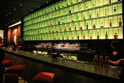 An illuminated bar brightens the space.