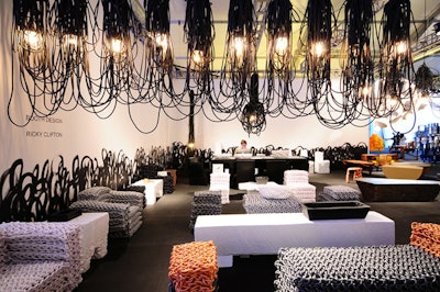 New York-based Johnson Trading Gallery's exhibition space, designed by Ricky Clifton, showcased furniture and light fixtures made entirely of hoses woven together.
