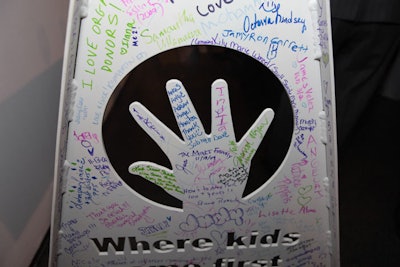 Guests, construction workers, and hospital staffers signed the uppermost beam of the Ann & Robert H. Lurie Children's Hospital of Chicago.