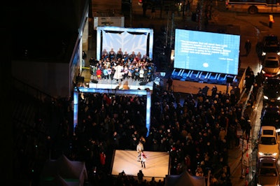 During the topping-off ceremony, an elevated skating rink, a stage, and a 20-foot LED screen overtook the plaza of the Museum of Contemporary Art.