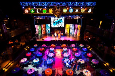 Cocktail tables filled the main floor and were later cleared for dancing.