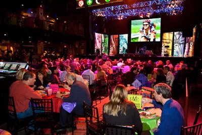 Nearly 800 cyclists and volunteers sat down to a casual dinner while a photo slide show played on stage.