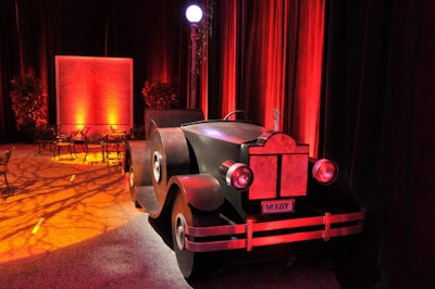 Wizard Connection designed a model of a 1920s-style automobile that was parked in a portion of the ballroom designed as a street.
