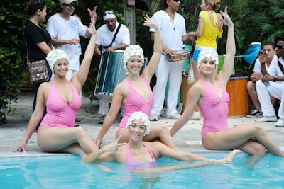 Synchronized swimmers performed in the pool at the Shore Club as part of the Peace Dance Art performance Friday afternoon.
