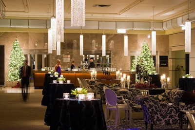 Black and white couches provided seating for guests during the cocktail reception in the Carlu's foyer.