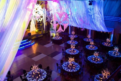 Event organizers draped panels of sheer white fabric from the ceiling in the concert hall, which doubled as the dining area.