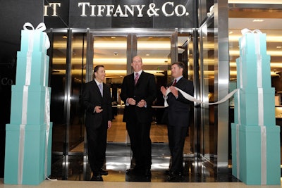 Executives participated in a ribbon cutting for Tiffany, the first store to open at retail complex Crystals.