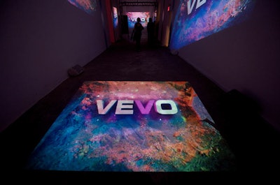 Floor projections displayed Vevo's logo and marketing imagery.