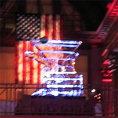 The main ice sculpture showed a hand grasping a martini.