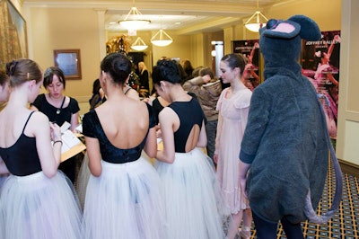 Costumed students from the Joffrey Ballet Academy of Dance helped sell raffle tickets; Clara and the Mouse King were among the Nutcracker characters that made appearances.