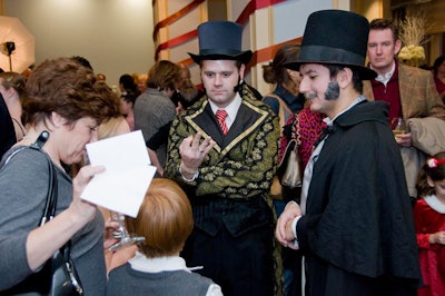Costumed magicians performed tricks as guests had cocktails.