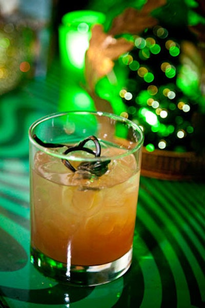 A cocktail called Evil Bitch included spiced rum stirred with chilled spiced tea, citrus, and berries, and a licorice garnish.