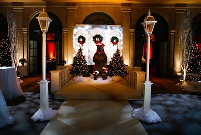 Near the entrance, guests could pose for a photo-op with stuffed toy bears and holiday decor.