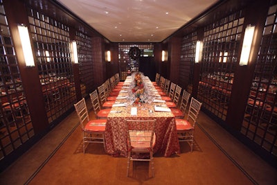 A table placed near the silent auction area offered a more private dining experience for guests, away from the main dining room.