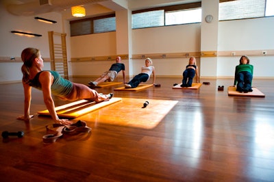 Exhale Spa can provide private yoga and core-strengthening classes for groups of four to 25.