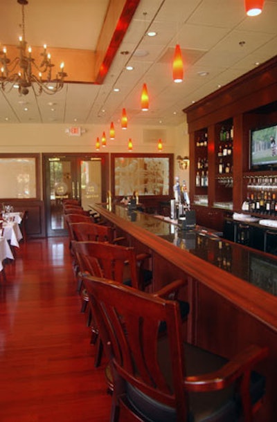 The restaurant features a 16-seat wooden bar.
