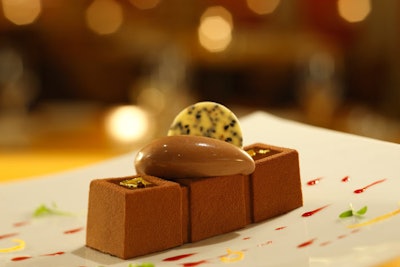 A dessert of chocolate mousse with caramel and sesame exemplifies the restaurant's use of unusual flavor combinations.