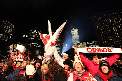 Thousands of people filled Nathan Phillips Square for a ceremony to welcome the Olympic flame to Toronto.