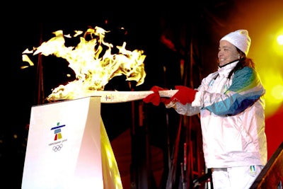 Scarborough native and Olympic hockey player Vicky Sunohara lit the cauldron in Nathan Phillips Square.