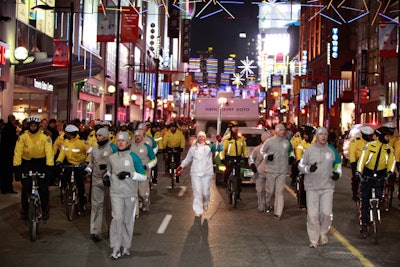 Dozens of police officers escorted the torch relay, which was briefly delayed due to a native protest at Yonge and College Streets.