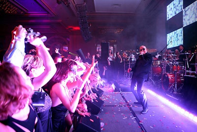 Pitbull, the rapper known for songs such as 'Hotel Room Service' and 'Calle Ocho,' performed in the International ballroom shortly after midnight.
