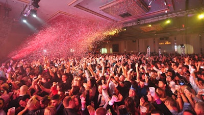 In the seconds leading up to midnight, guests counted down as confetti poured from the ceiling of the ballroom.