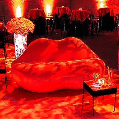 Avi Adler's decor included a mix of furniture, including a couch shaped like a pair of gigantic lips from Props for Today.
